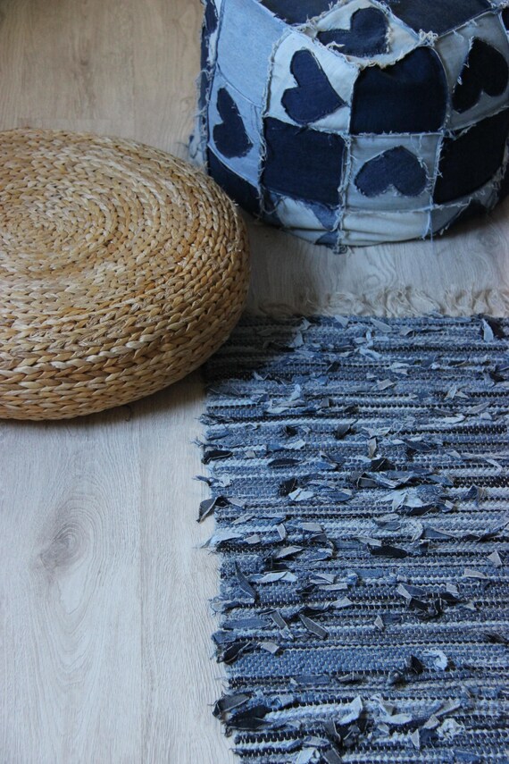 woven denim rug on floor