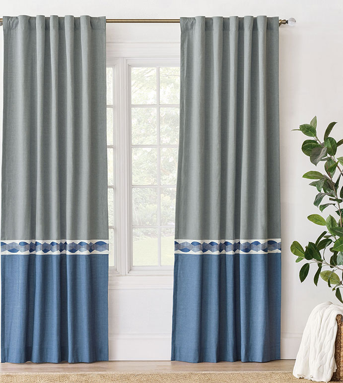 denim curtain panel on window