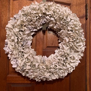 book page wreath on door