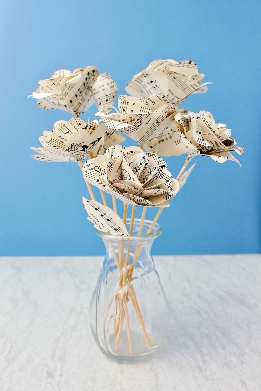 book page covered glass vase