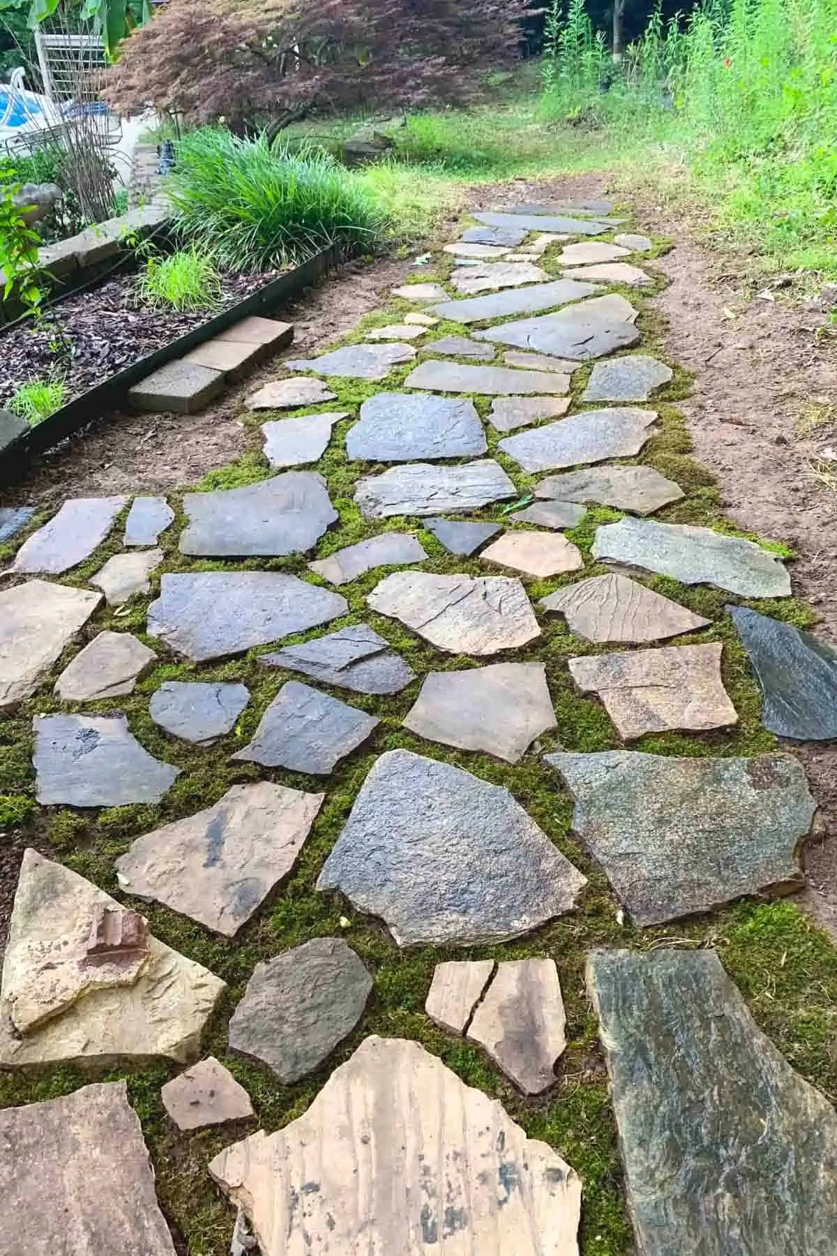 natural flagstone path with moss