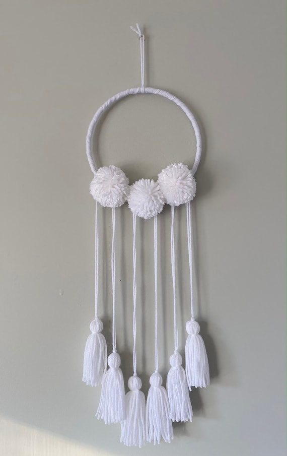 boho pom pom wall hanging