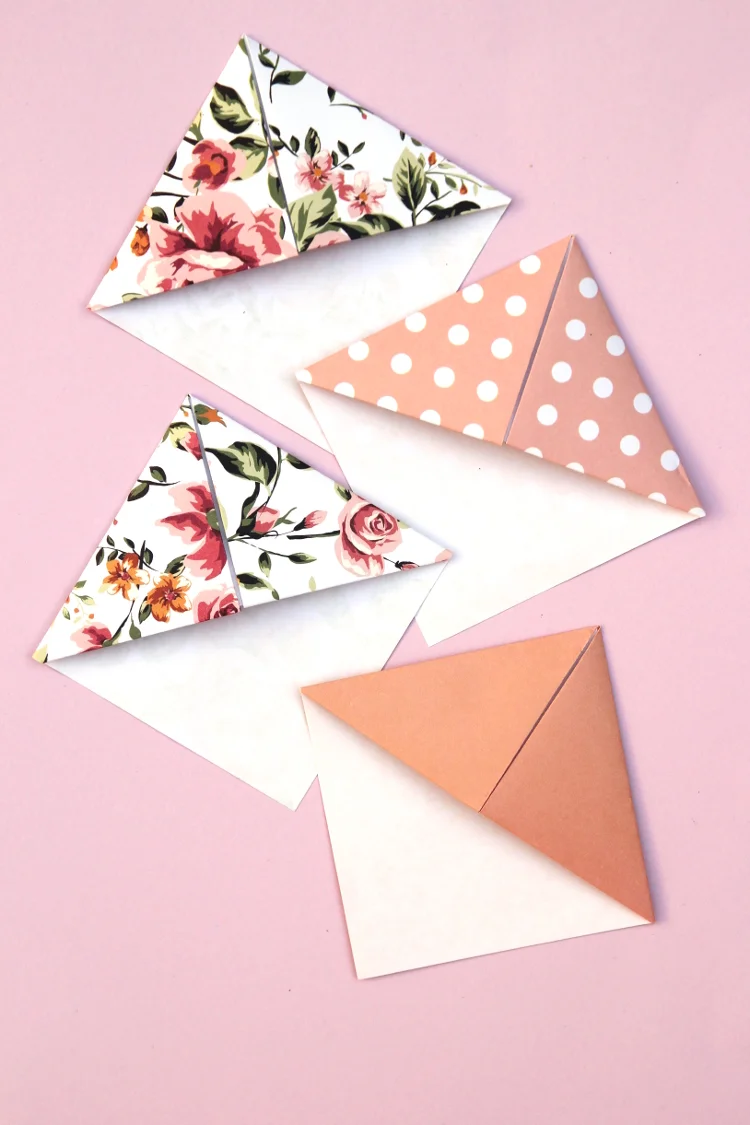 origami paper corner bookmark on book