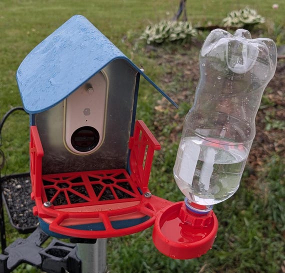 fence attached plastic bottle planters