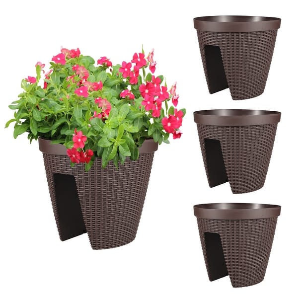 plastic bottle planters attached to balcony railing