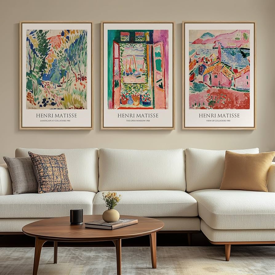 living room wall with mixed art pieces