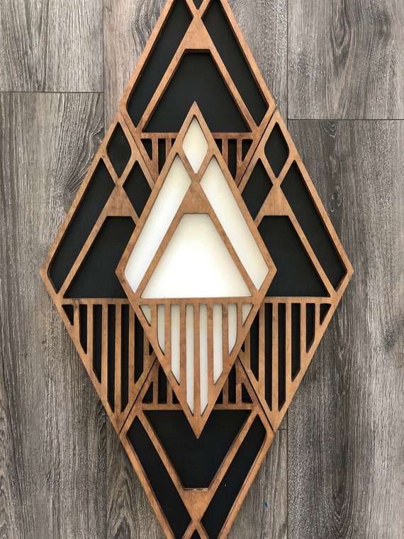geometric wood wall art triangles on white wall