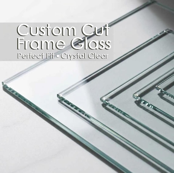 multiple picture frames arranged as window pane