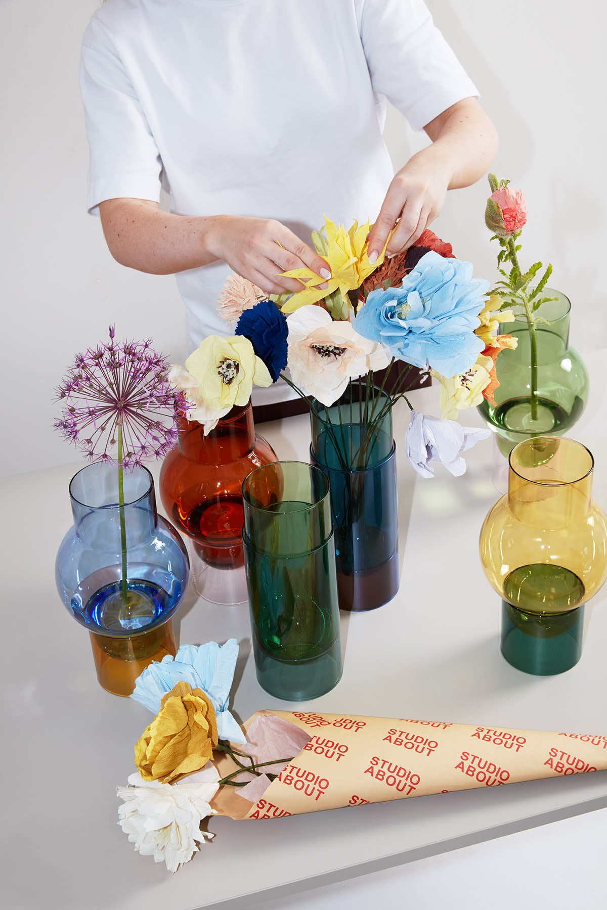 paper flower bouquet in glass vase