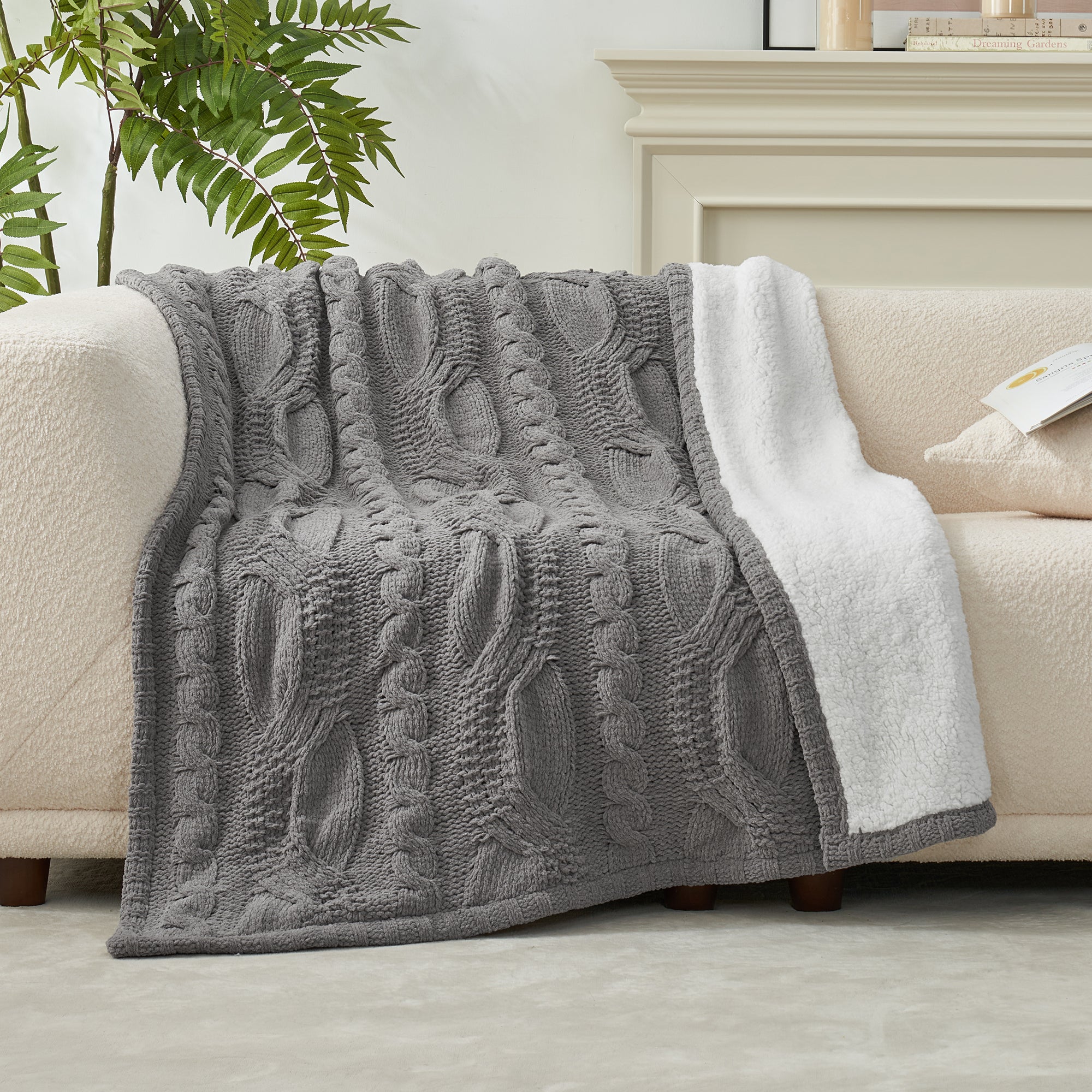 knit throw blanket draped over sofa cozy living room fall decor