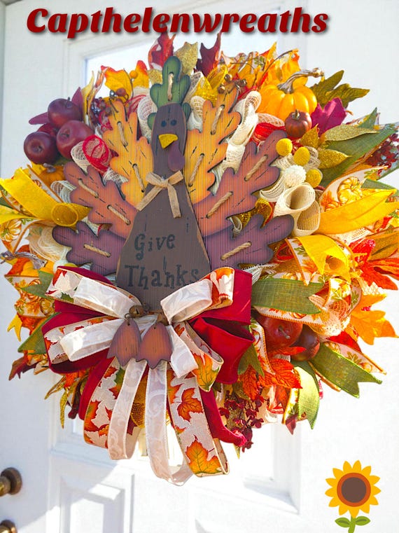 fall leaf wreath on wooden door
