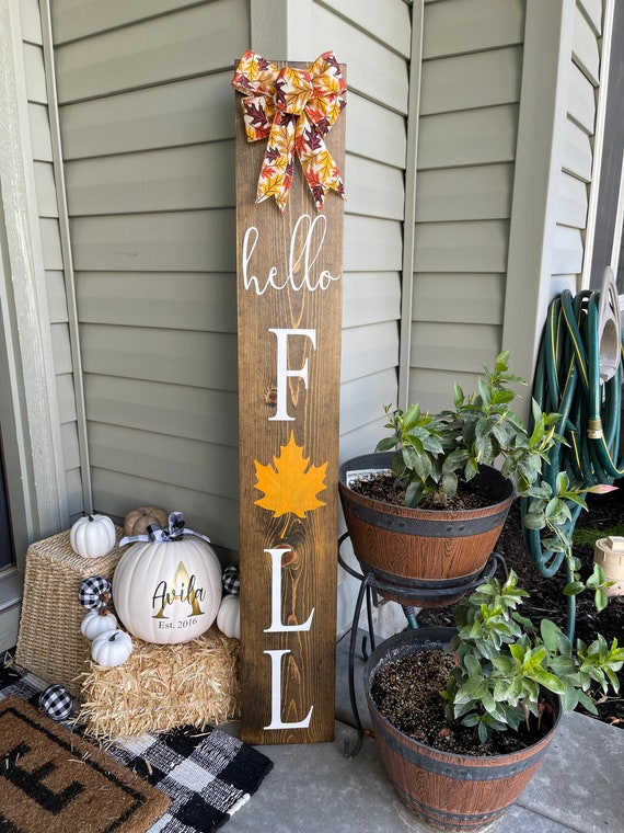 wooden fall welcome sign on porch