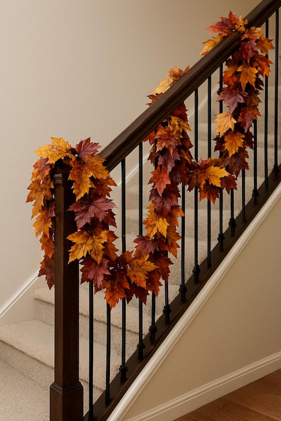 fall leaf garland draped on porch railing