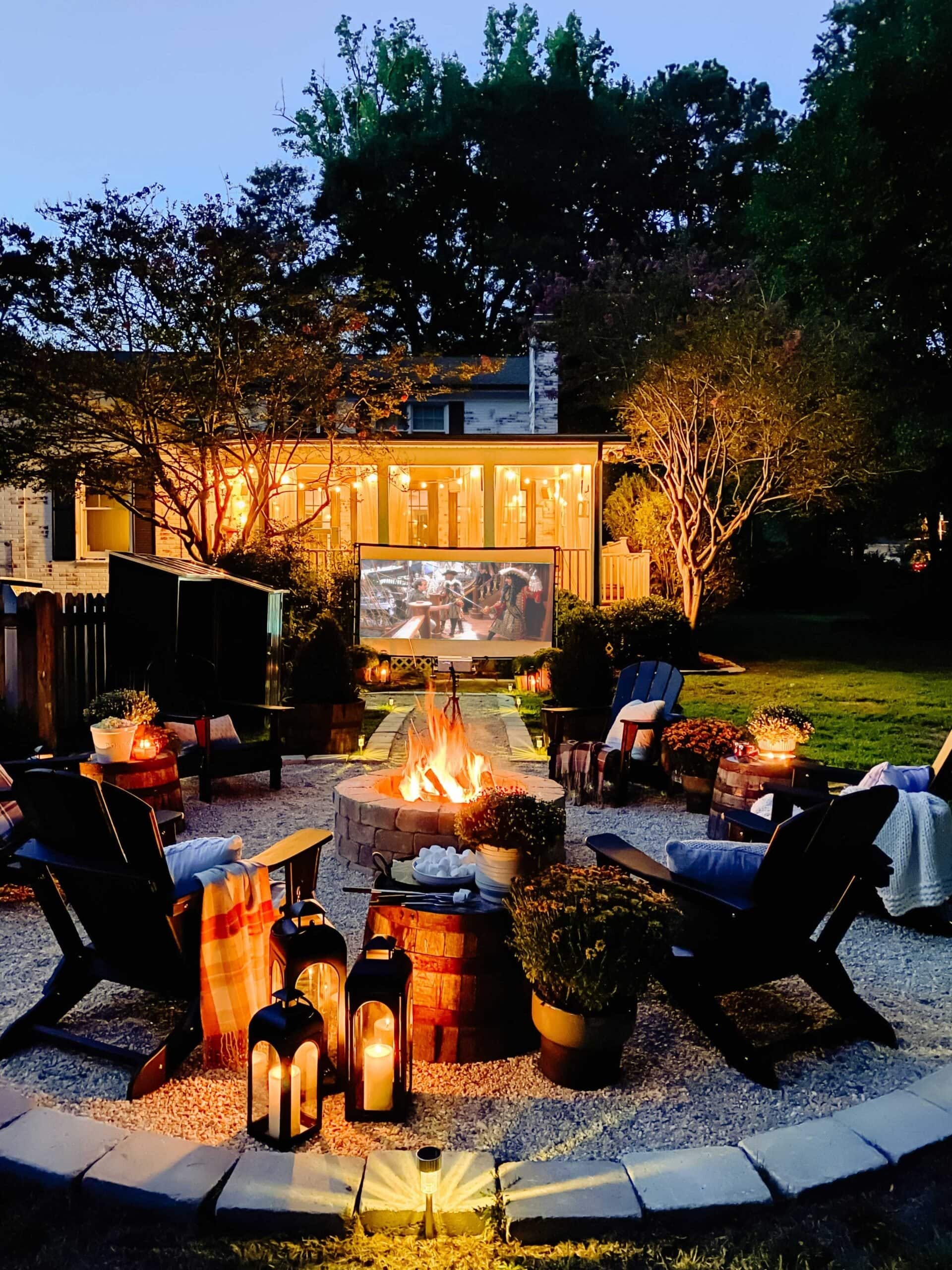 fire pit with fall decor on porch