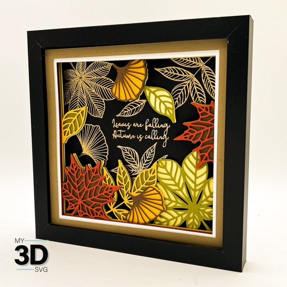 shadow box with arranged fall leaves