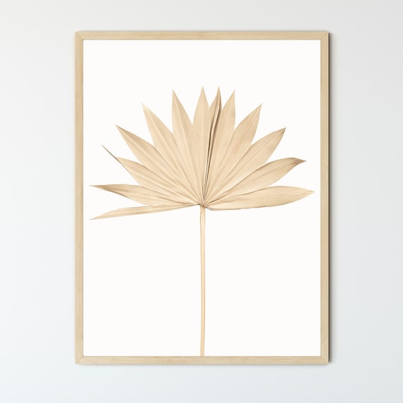 dried leaf wall hanging on neutral wall