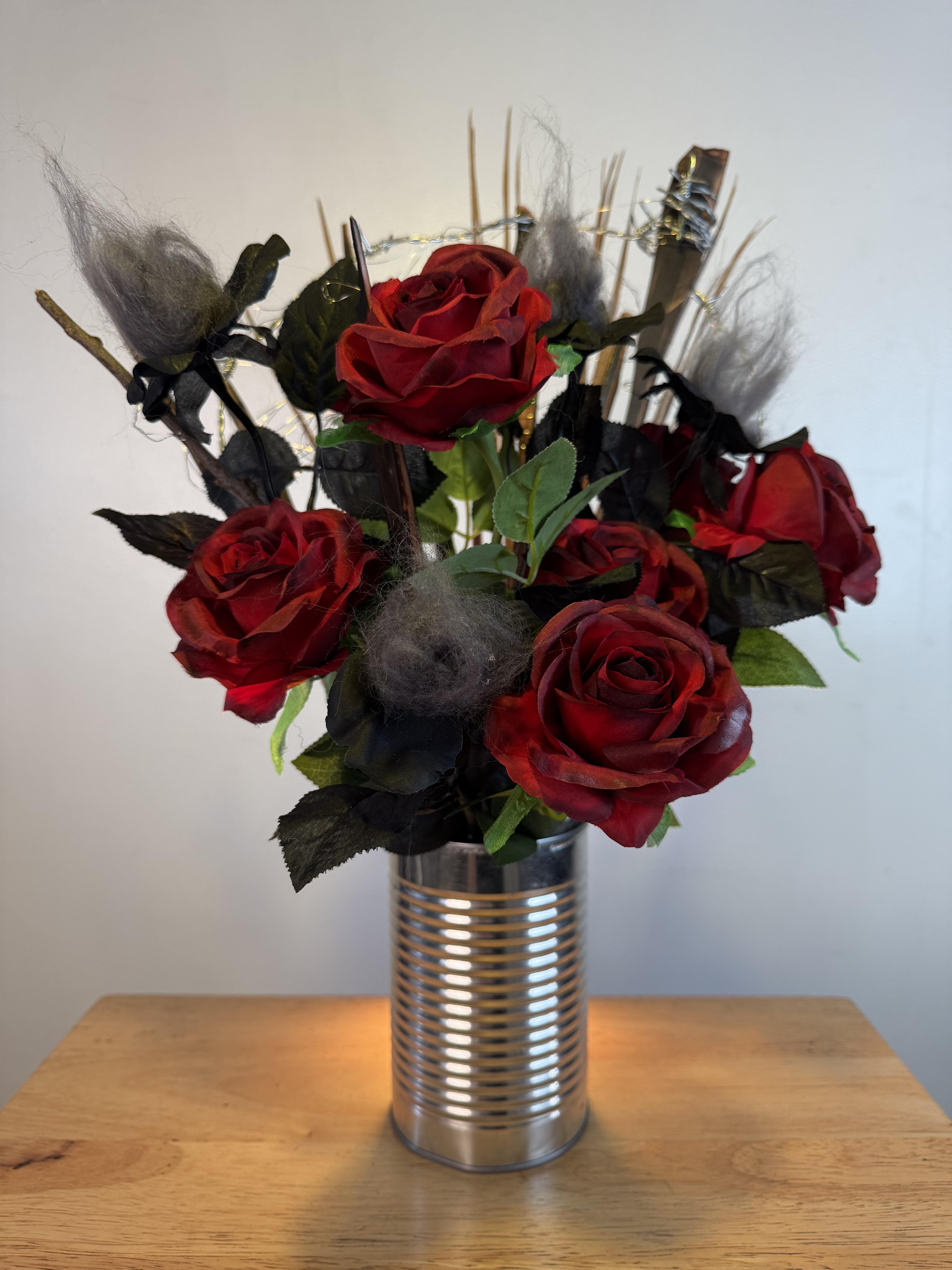 tin can vase with dried flowers