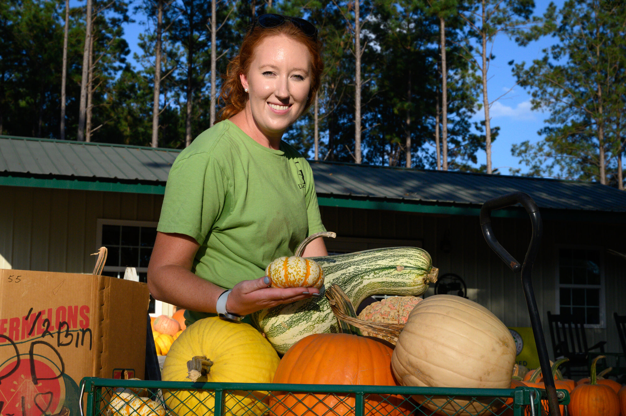 stacked apple crates with gourds fall garden