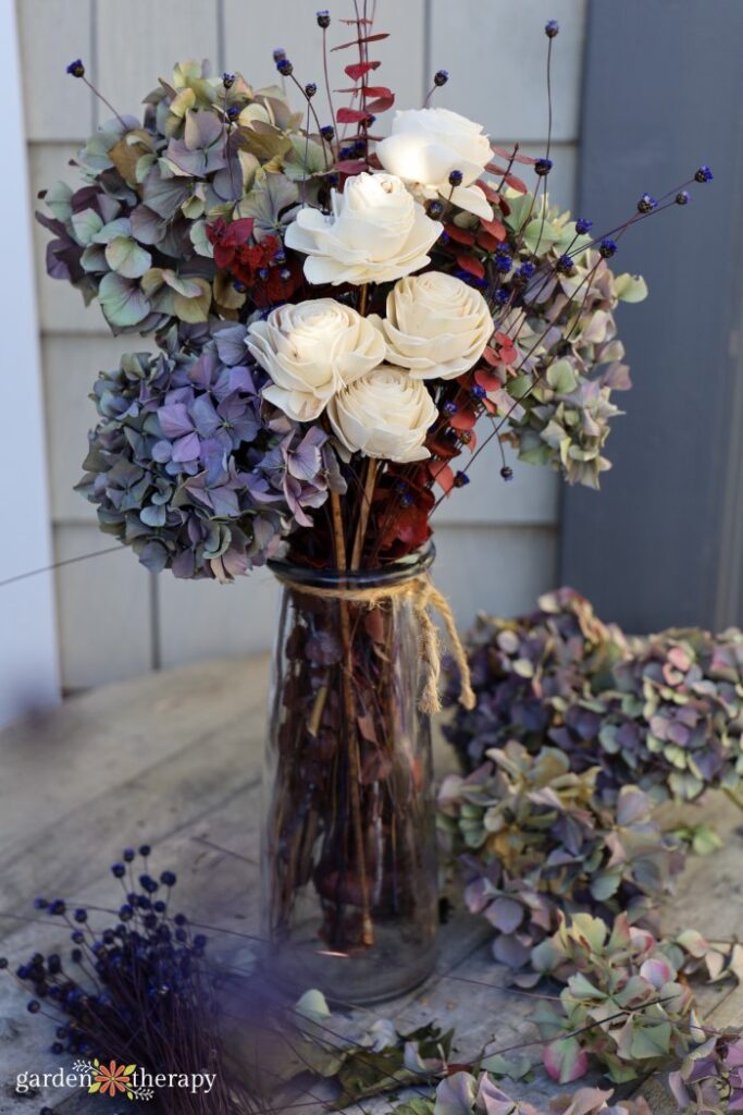 dried flower arrangement in garden vase