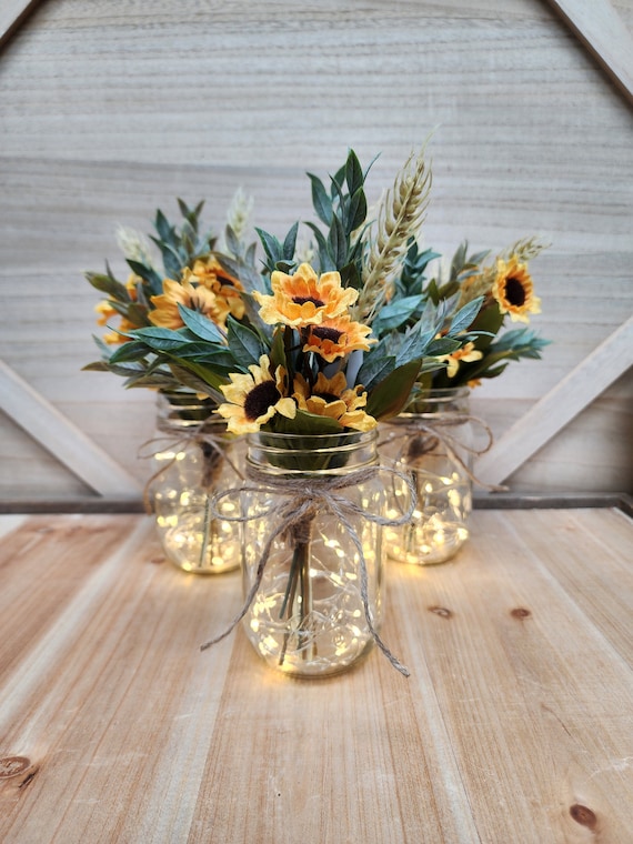 mason jar candle holders with twine and leaves fall centerpiece dining