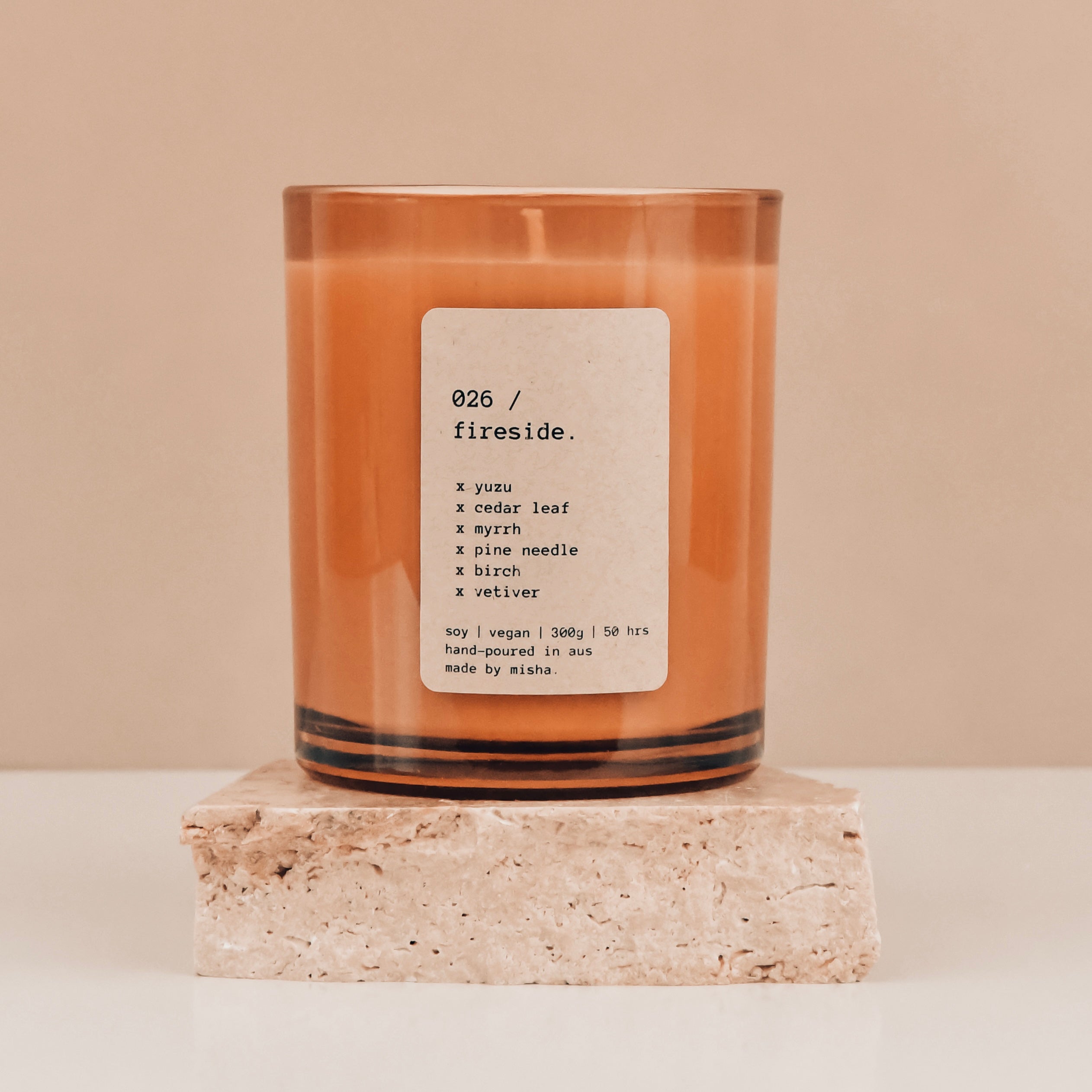 fireside pine candle with pine needles