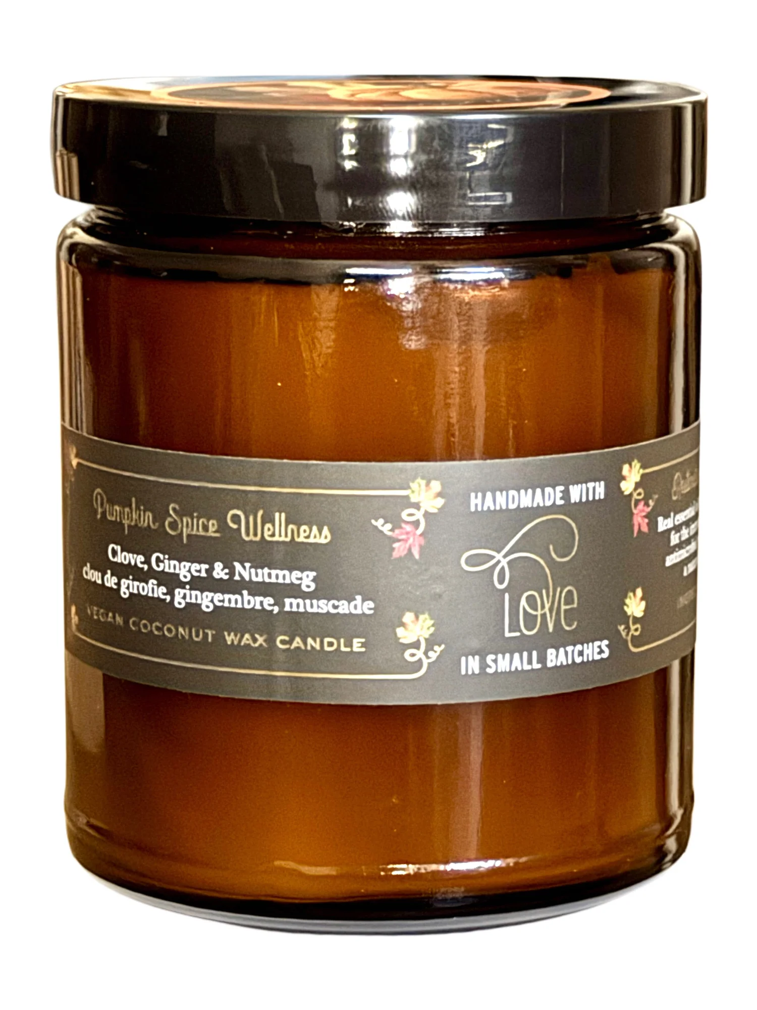 nutmeg clove candle in amber jar