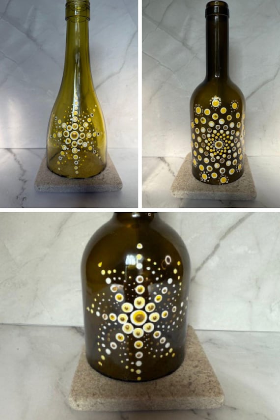 gold painted wine bottle lantern with candle