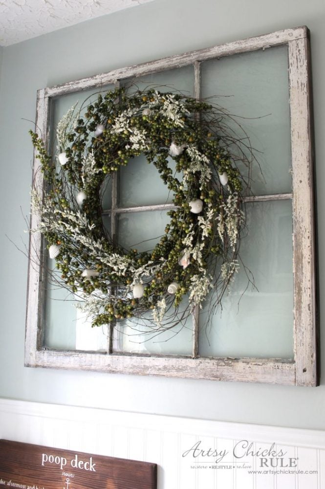 old window with fall wreath