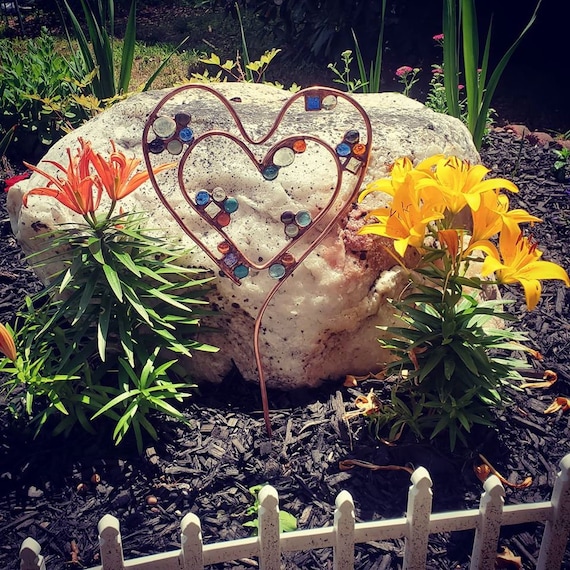 copper pipes as garden stakes