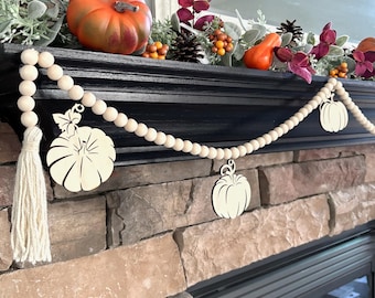 fall garland on wooden mantel