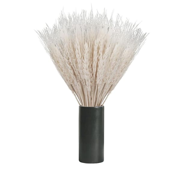 dried wheat bundle in ceramic vase on kitchen shelf