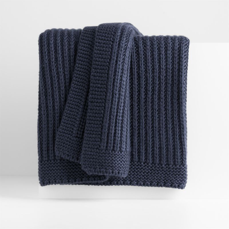 knit dishcloths and wool throw on kitchen chair