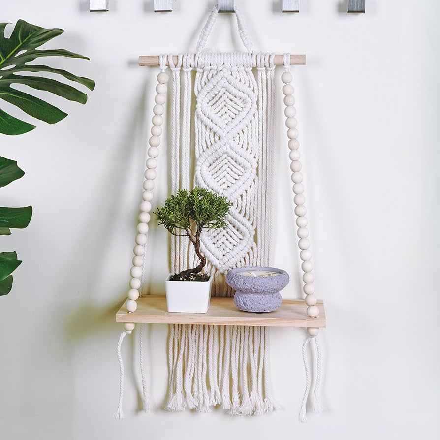 rope macrame wall hanging on wood wall
