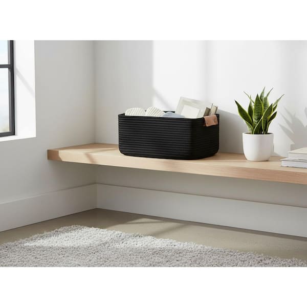 rope woven storage basket on shelf