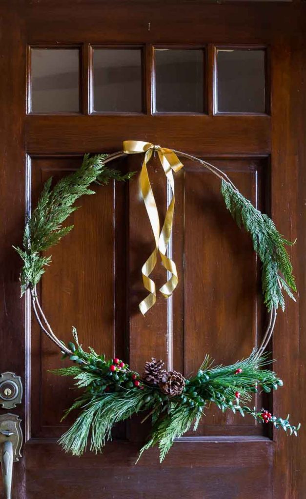 finished natural wreath on wooden door