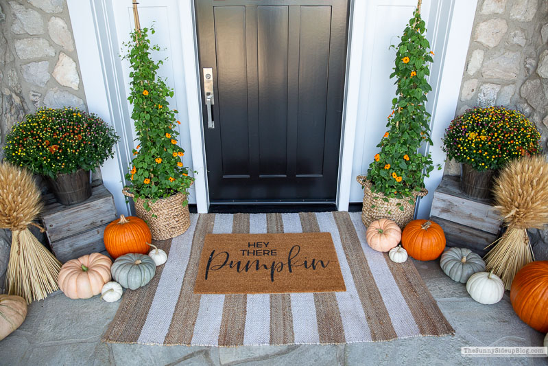 fall porch with pumpkins