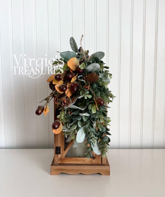 wooden lanterns on fall mantel