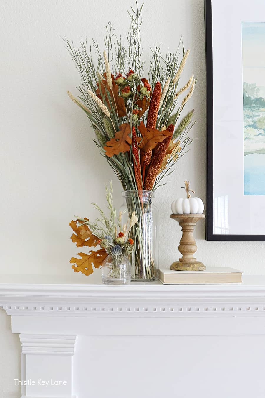 dried floral arrangement on mantel