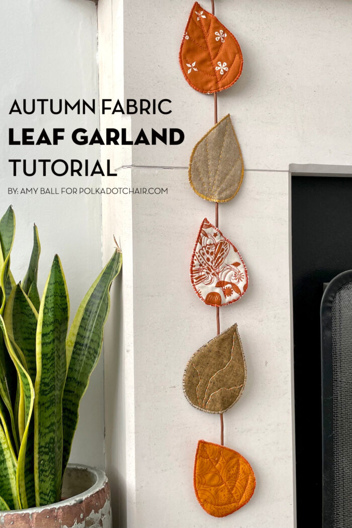 autumn leaf garland on fireplace mantel