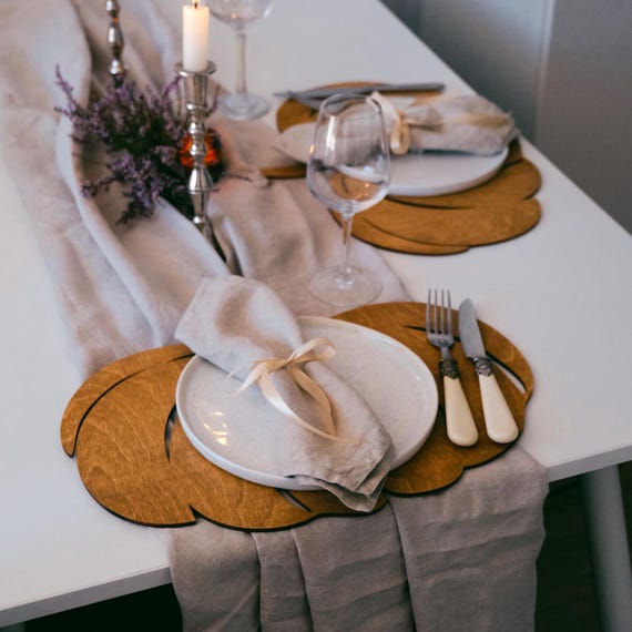 wood chargers under thanksgiving plates