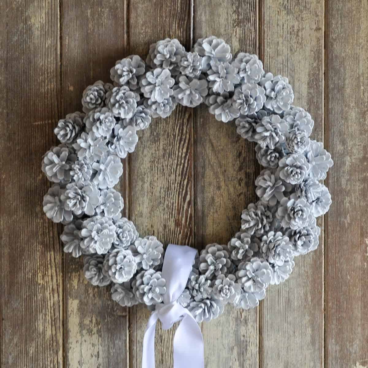 white painted pinecone wreath