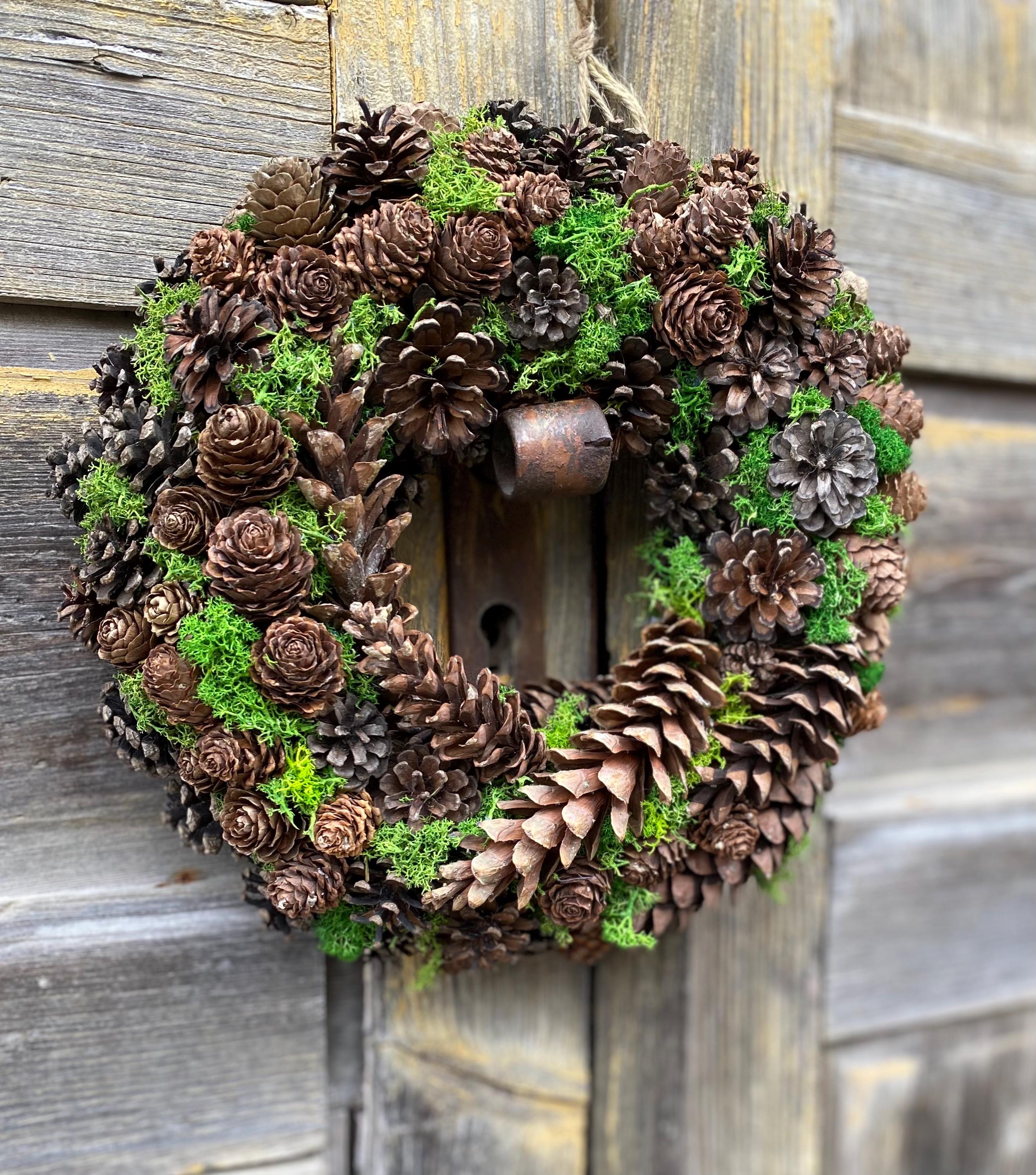 moss and pinecone wreath