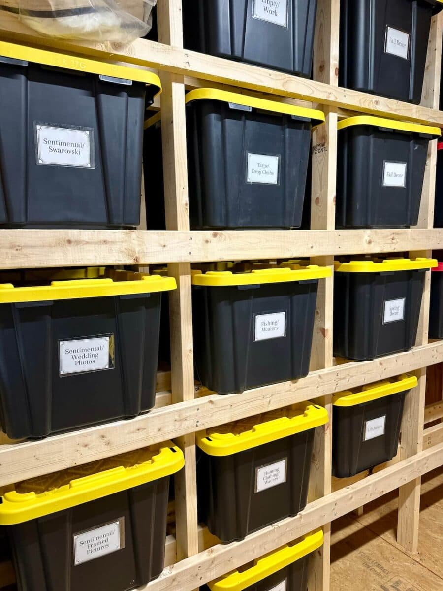 wooden bins with labels on fall shelf