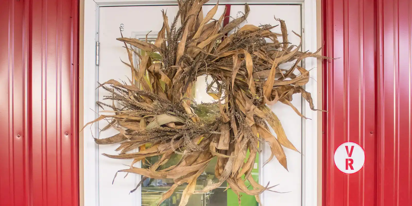 corn husk wreath with dried leaves