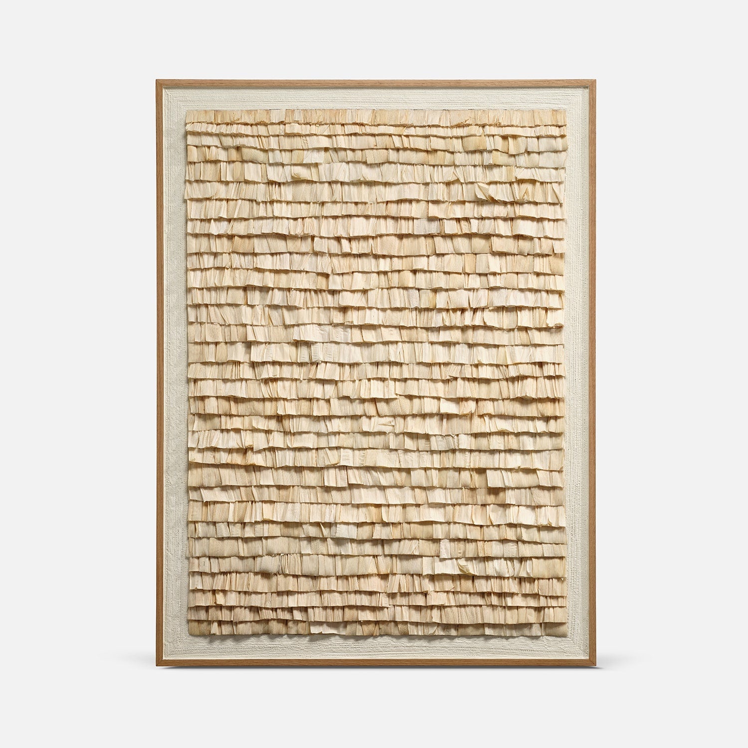corn husk wall art in wooden frame