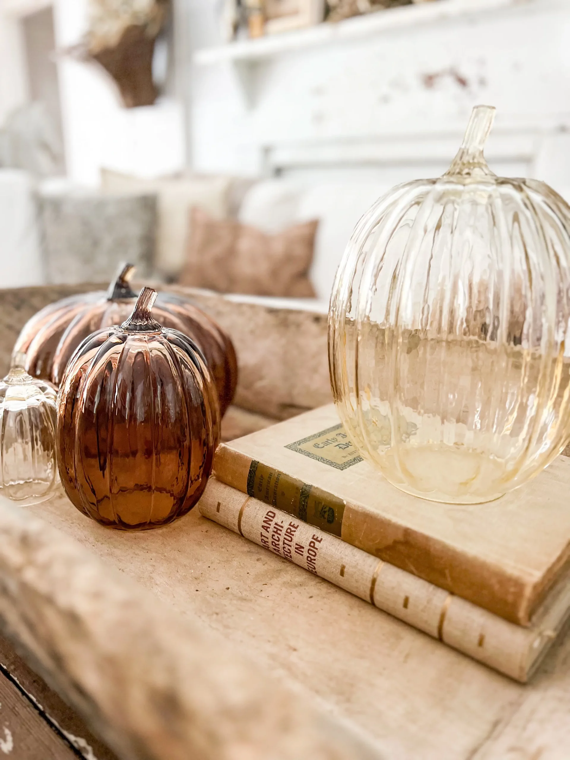 styled fall coffee table centerpiece with pumpkins