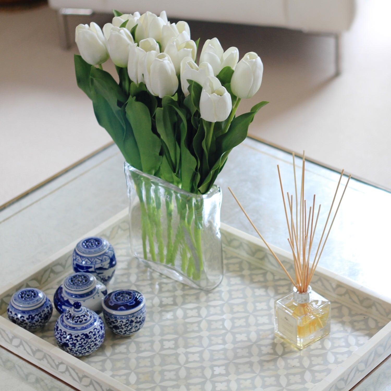 dried flowers in vase on coffee table