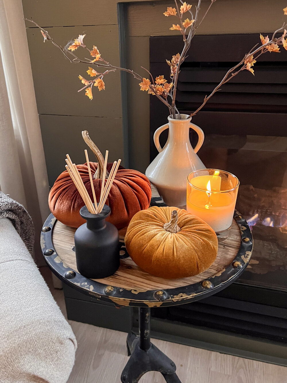 diffuser and fall decor on coffee table
