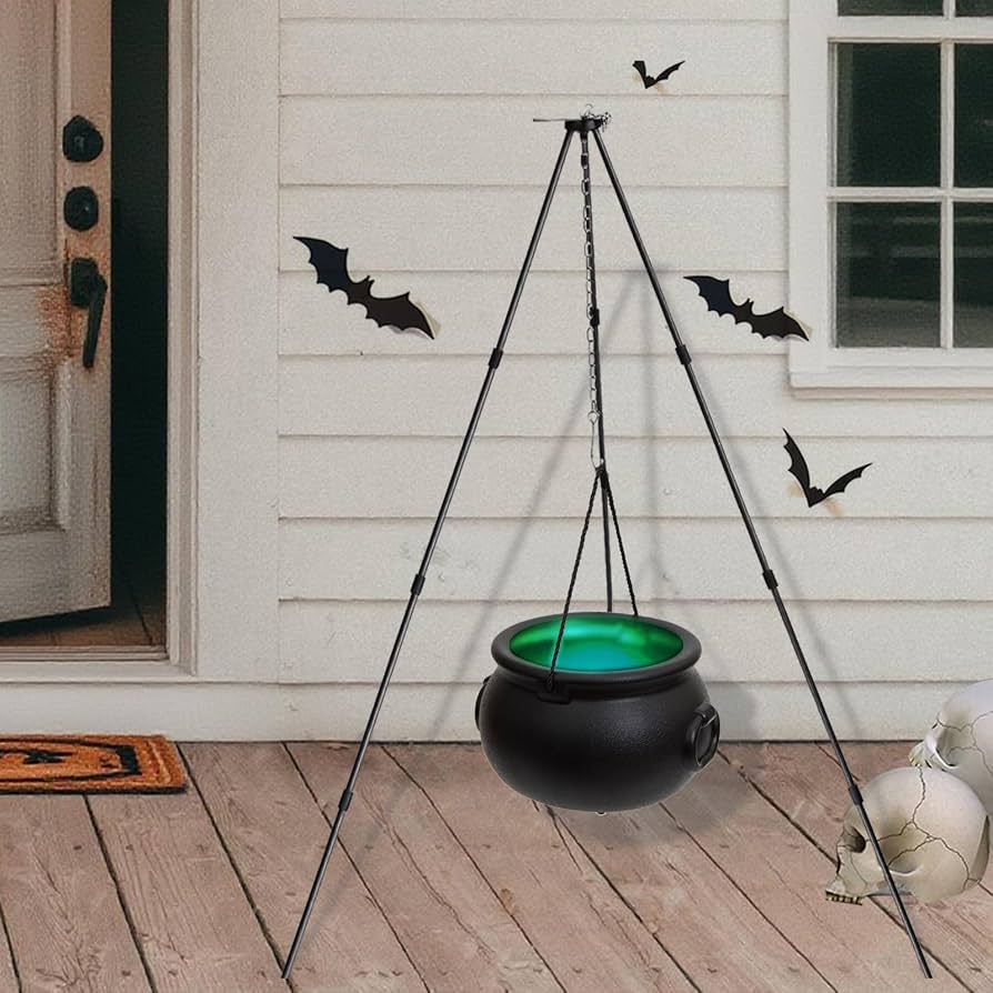 cauldron on halloween porch with lights