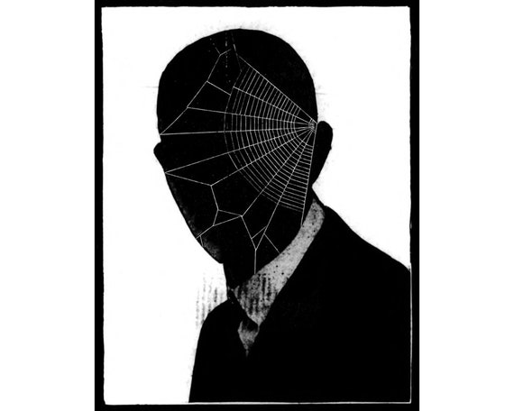 black and white haunted portraits on wall